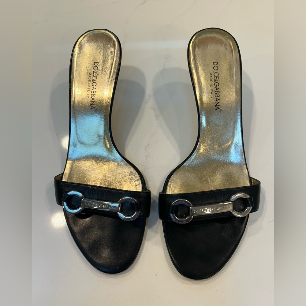 Dolce and Gabbana sandals.